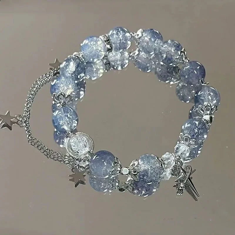 Armband med stjärntofs och kristall