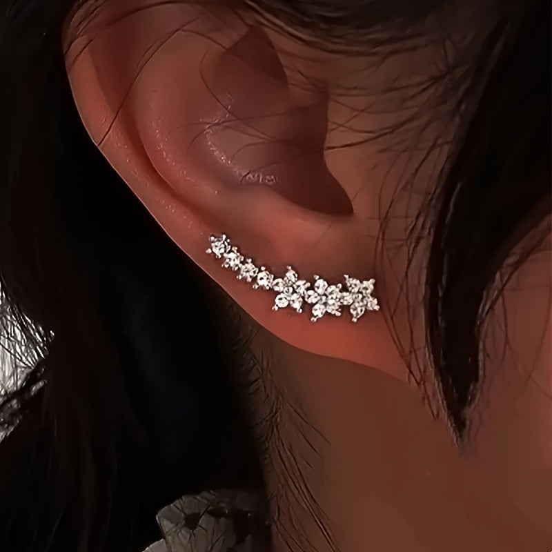 Lyxiga örhängen med blommig strass