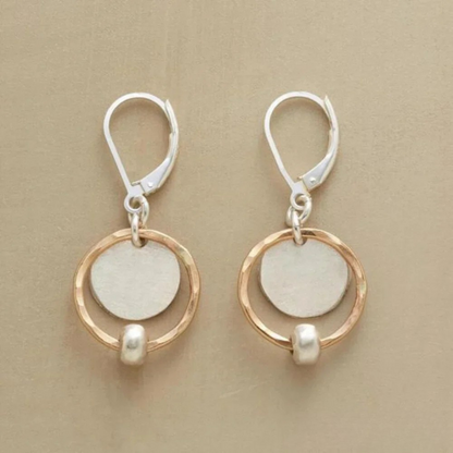 Eleganta örhängen i guld och silver med pärlor