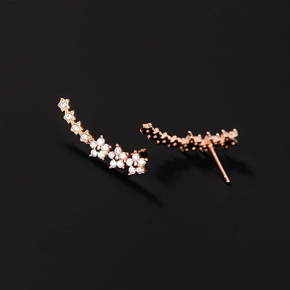 Lyxiga örhängen med blommig strass
