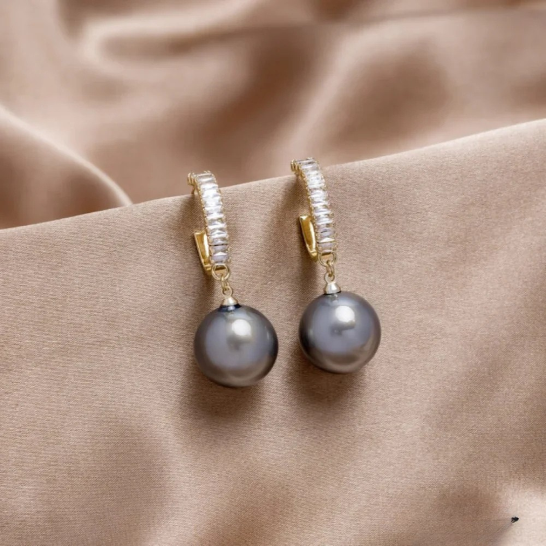 Eleganta örhängen med pärla och zirkonia 