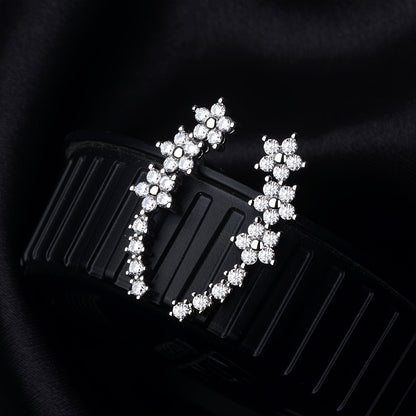 Lyxiga örhängen med blommig strass