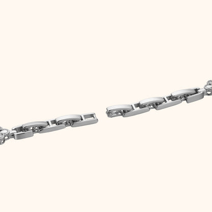 Silverfärgad blommig armbandsklocka