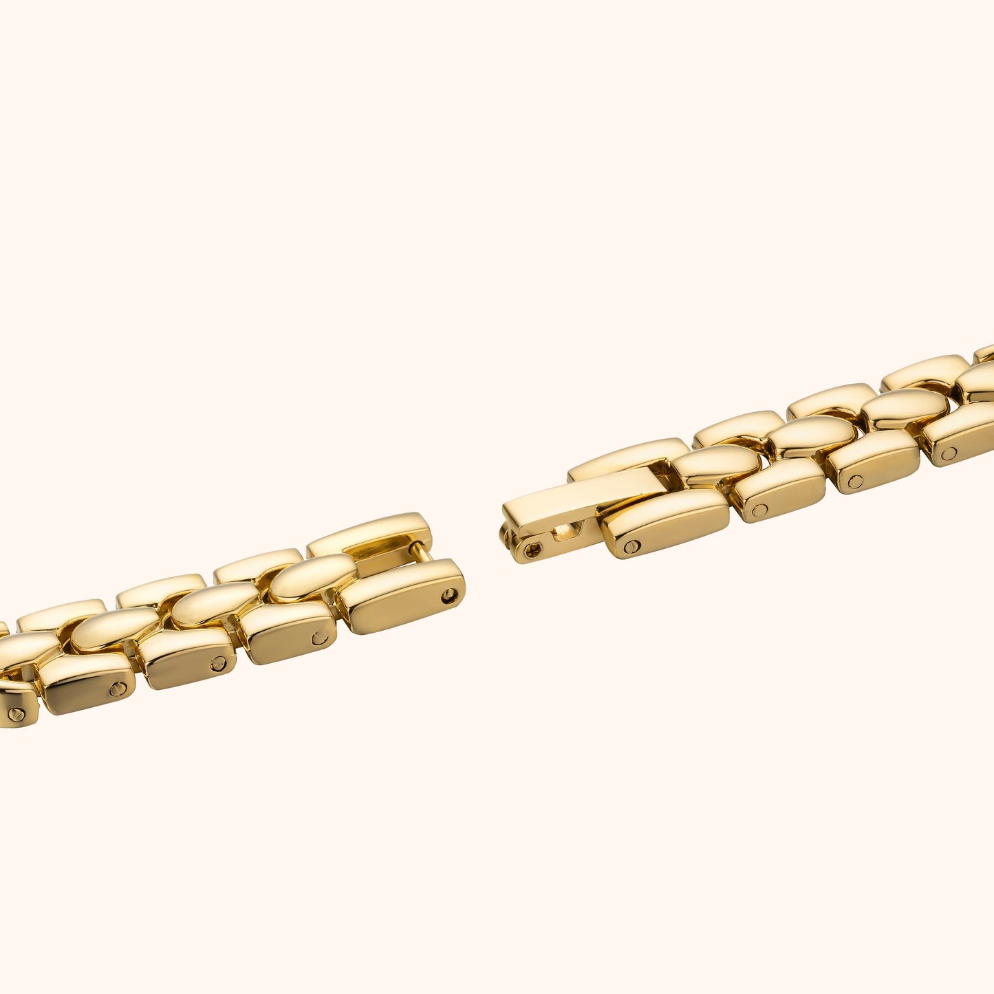 Armbandsklocka med ädelstenar och guld