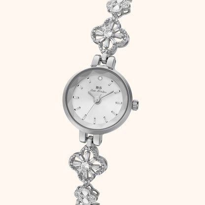Silverfärgad blommig armbandsklocka