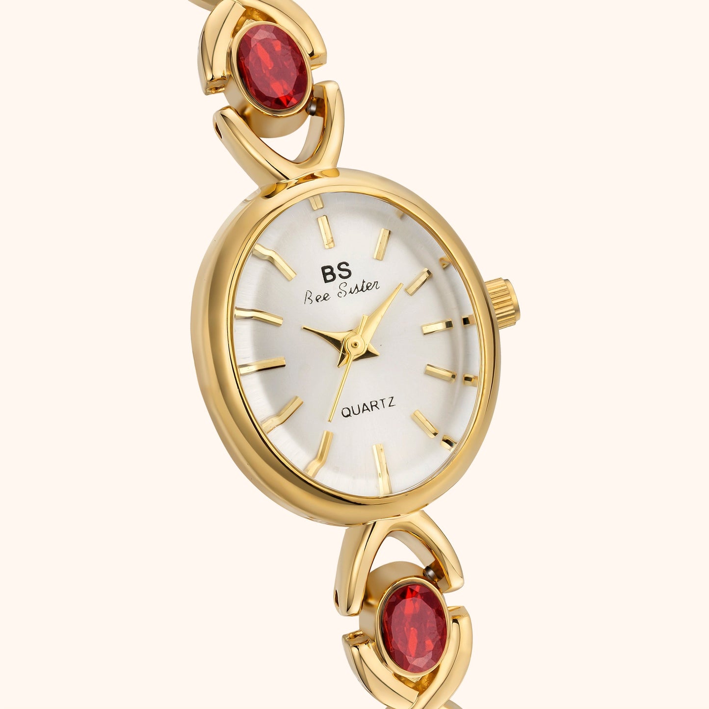 Armbandsklocka med ädelstenar och guld