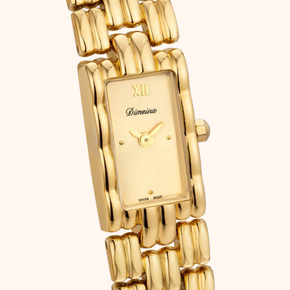 Rektangulärt armbandsur med guldfärgad rem