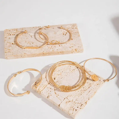 Arabella | Elegant guldknuten armbandsset