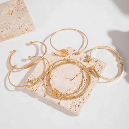 Arabella | Elegant guldknuten armbandsset
