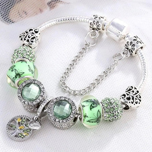 Elegant armband i sterlingsilver med gröna kristaller 
