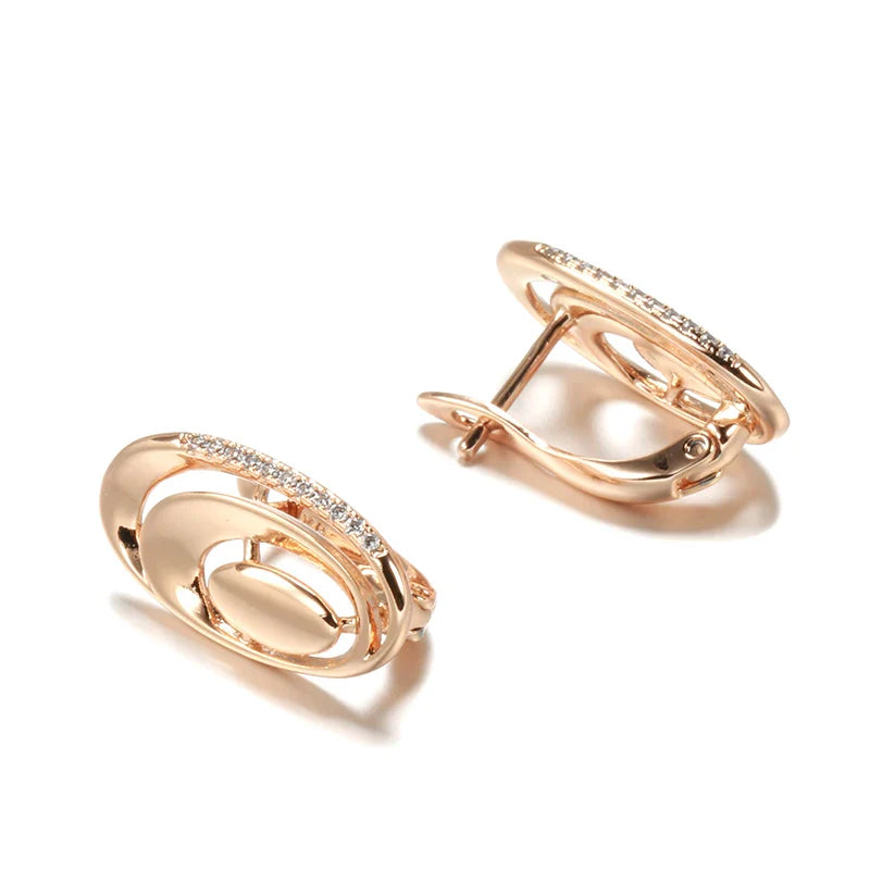 Roséguldörhängen med geometrisk droppdesign