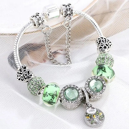 Elegant armband i sterlingsilver med gröna kristaller 