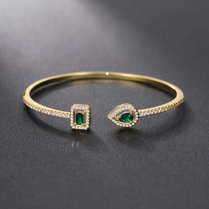 Gyllene armband med ädelsten