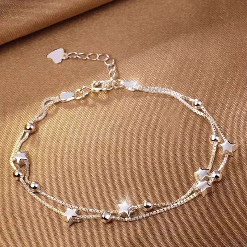 Armband med stjärntofs och kristall 