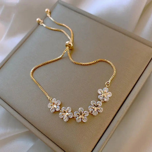 Armband Kristall Daisy i Guld 