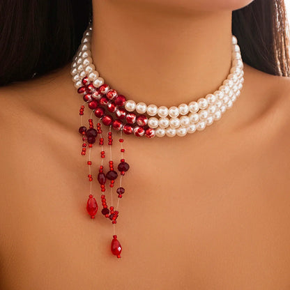 Bergqvist™ | Gothic Pearl Choker with Red Bead Tassels