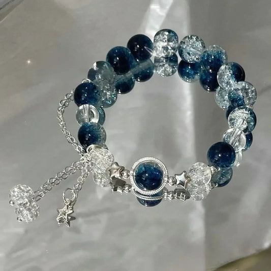 Armband med stjärntofs och kristall 