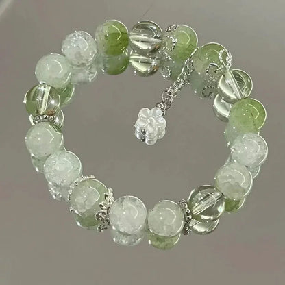 Armband med stjärntofs och kristall 