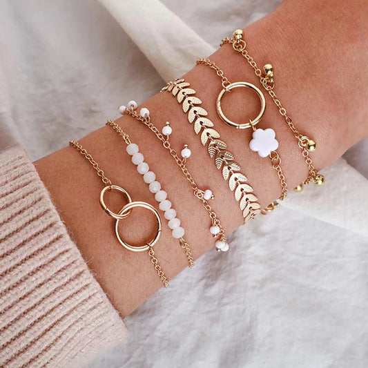 Charmigt guldfärgat boho armbandsset 