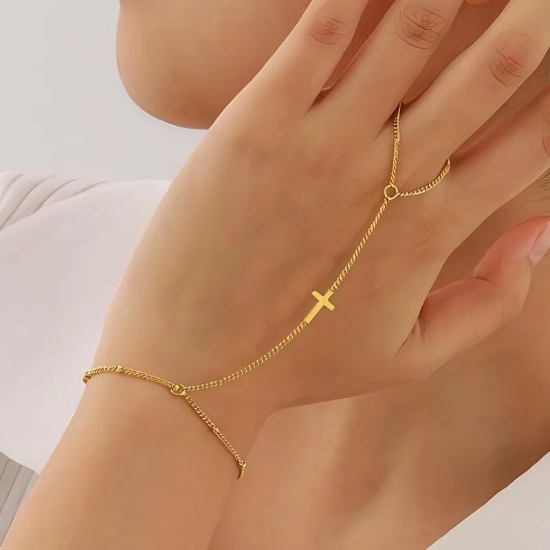 Armband med kors i guld