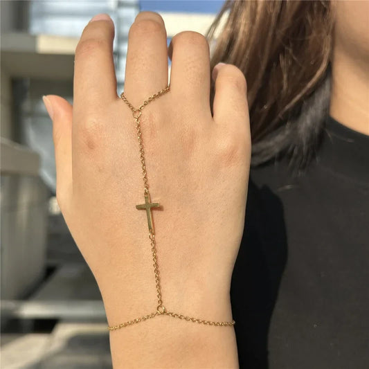 Armband med kors i guld