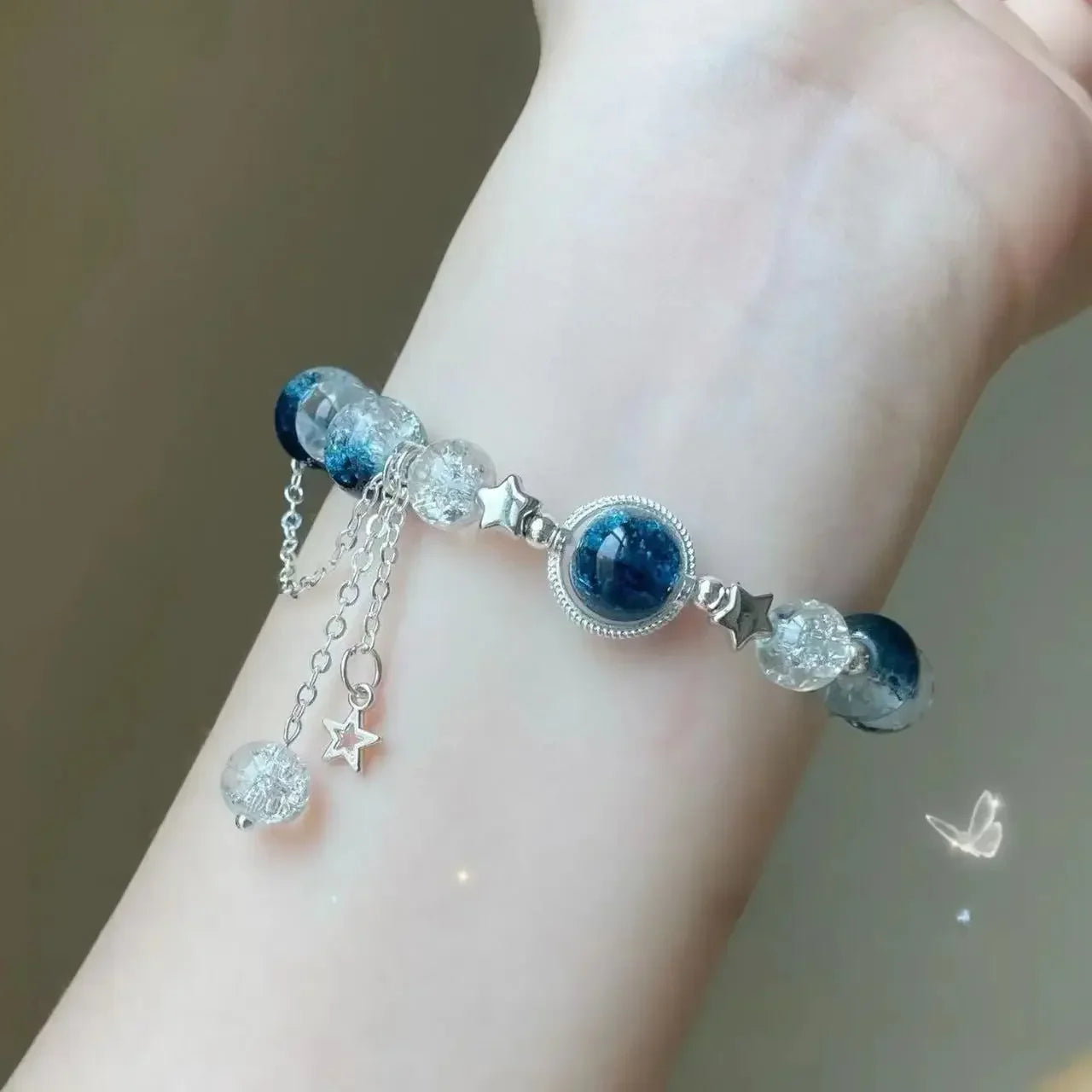 Armband med stjärntofs och kristall 