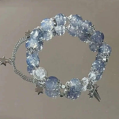 Armband med stjärntofs och kristall 
