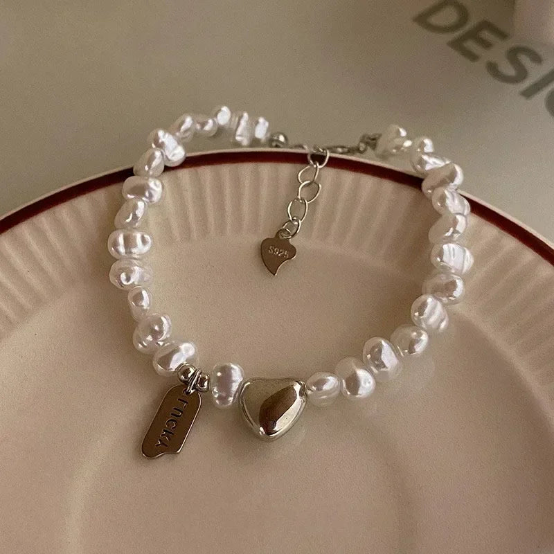 Armband med stjärntofs och kristall 