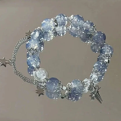 Armband med stjärntofs och kristall 
