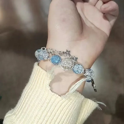 Armband med stjärntofs och kristall 