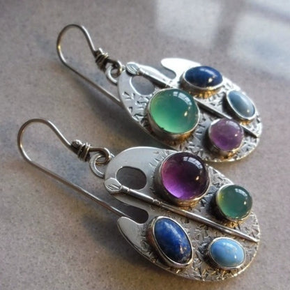 Flerfärgade stenörhängen i vintage-stil