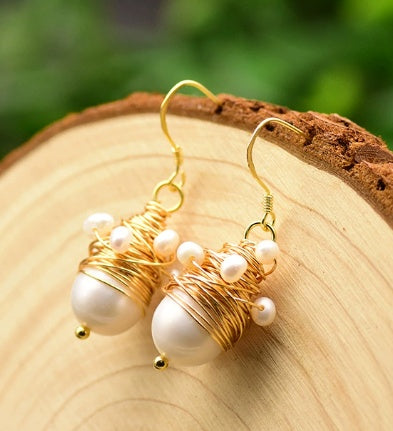 Vintage pärlörhängen med gyllene trådar