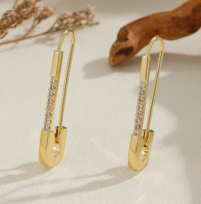 Långa vintageörhängen i roséguld