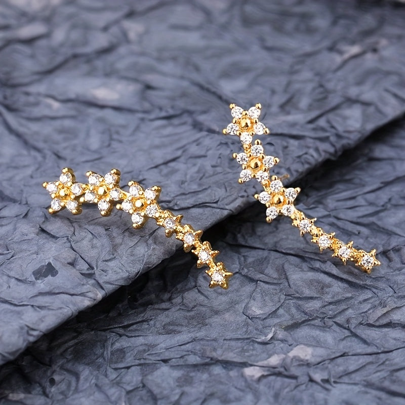 Lyxiga örhängen med blommig strass