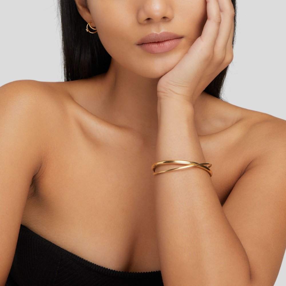 Armband med gyllene twist