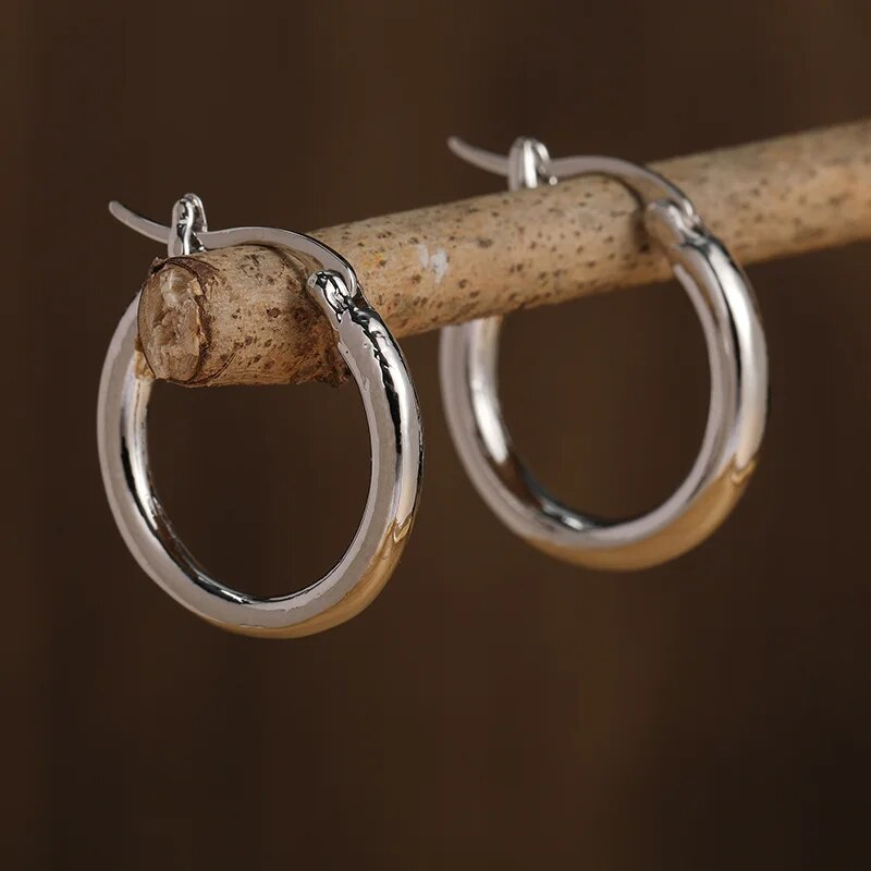 Vintage örhängen i guld och silver