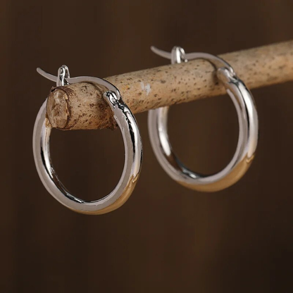Vintage örhängen i guld och silver