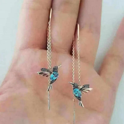 Emaljörhängen med kolibri och zirkoniumoxider 