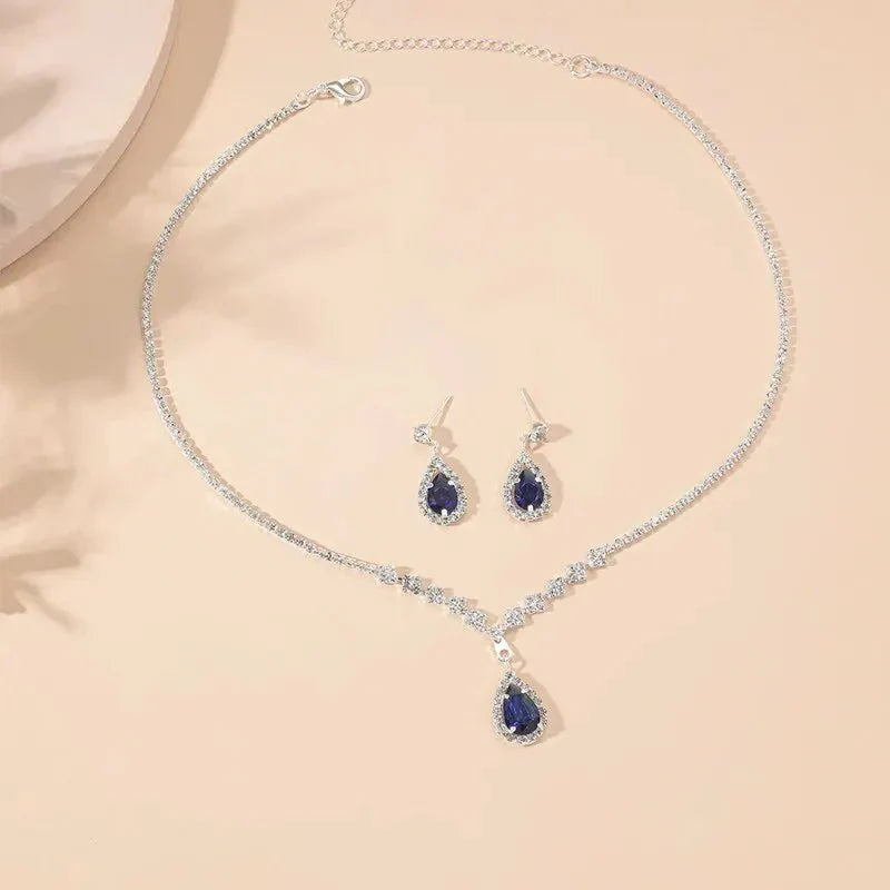 Shimmering Blue Teardrop Diamond Necklace and Earrings Set