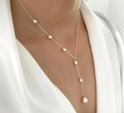 Elegant vintage-hängehalsband med pärlor