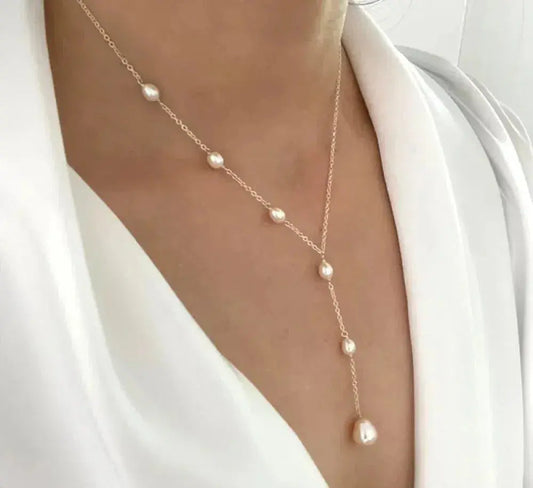 Elegant vintage-hängehalsband med pärlor